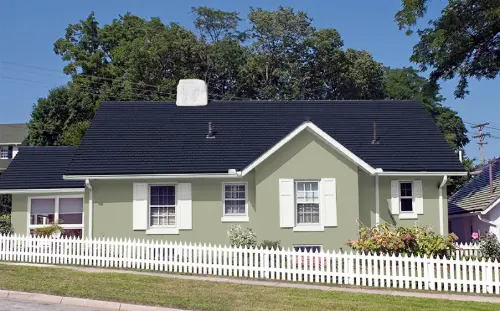 Sage Green Light exterior paint on Oklahoma City home - hides dust and adapts to lighting