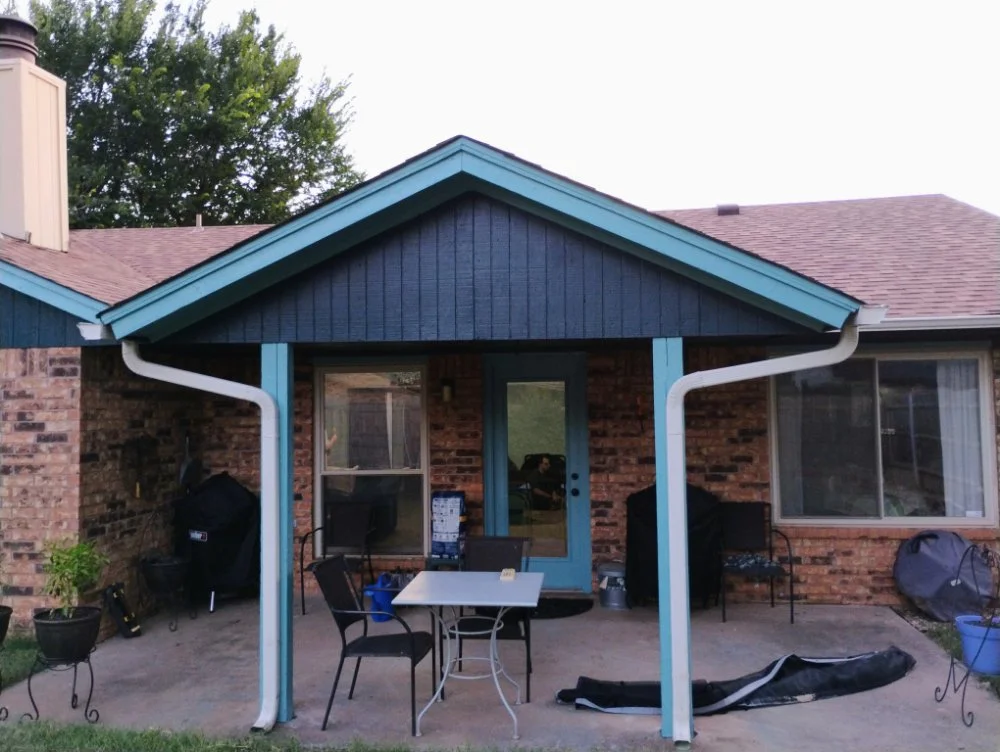 Exterior house thermal blue painting in Edmond, Oklahoma