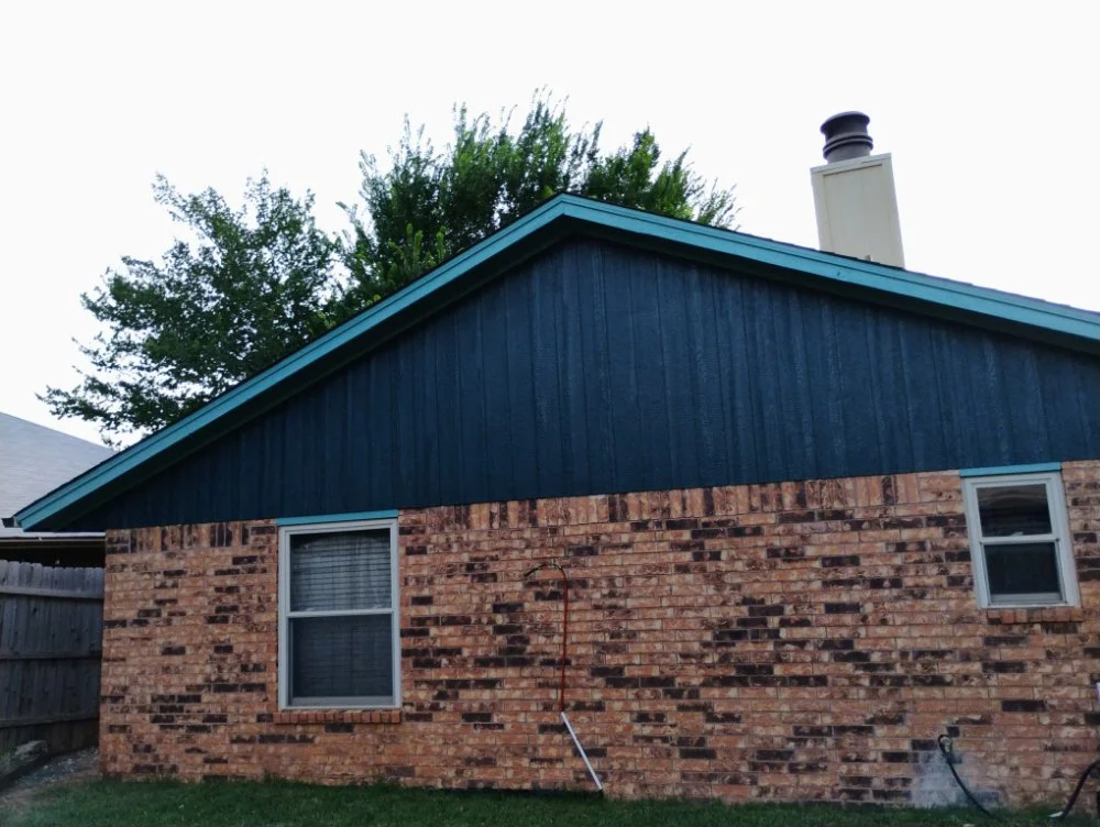 Exterior house thermal blue painting in Edmond, Oklahoma