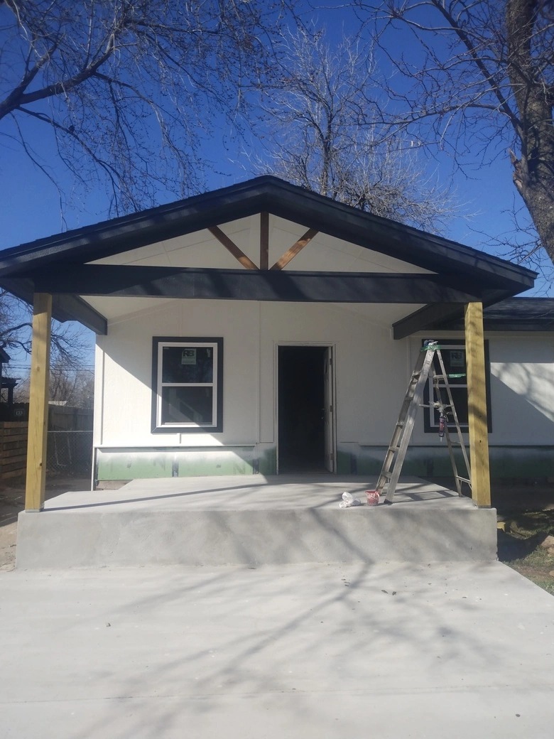 Exterior house white and black painting in Oklahoma City
