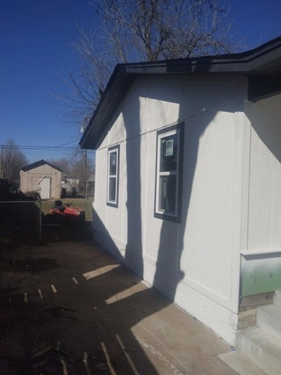 Exterior house white and black painting in Oklahoma City