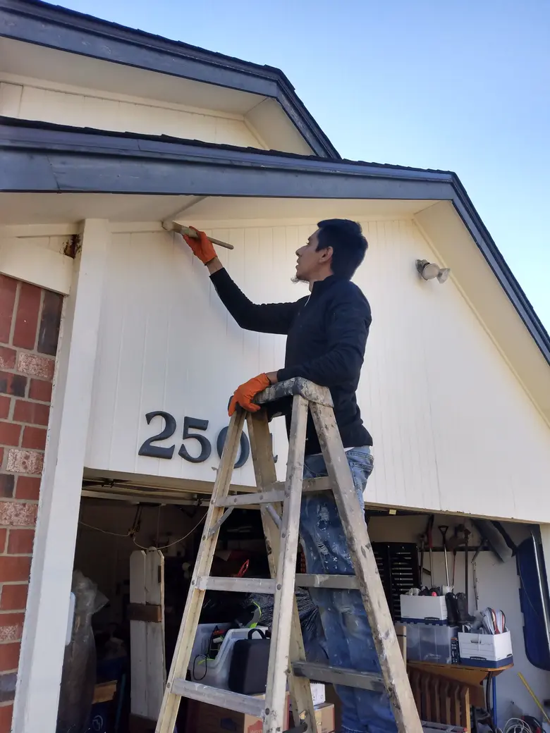 Exterior house tricorn black painting in Edmond, OK
